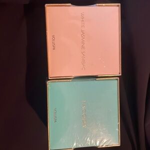 Two 2 oz Voluspa candles new in box.